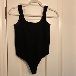 Black flattering body suit
